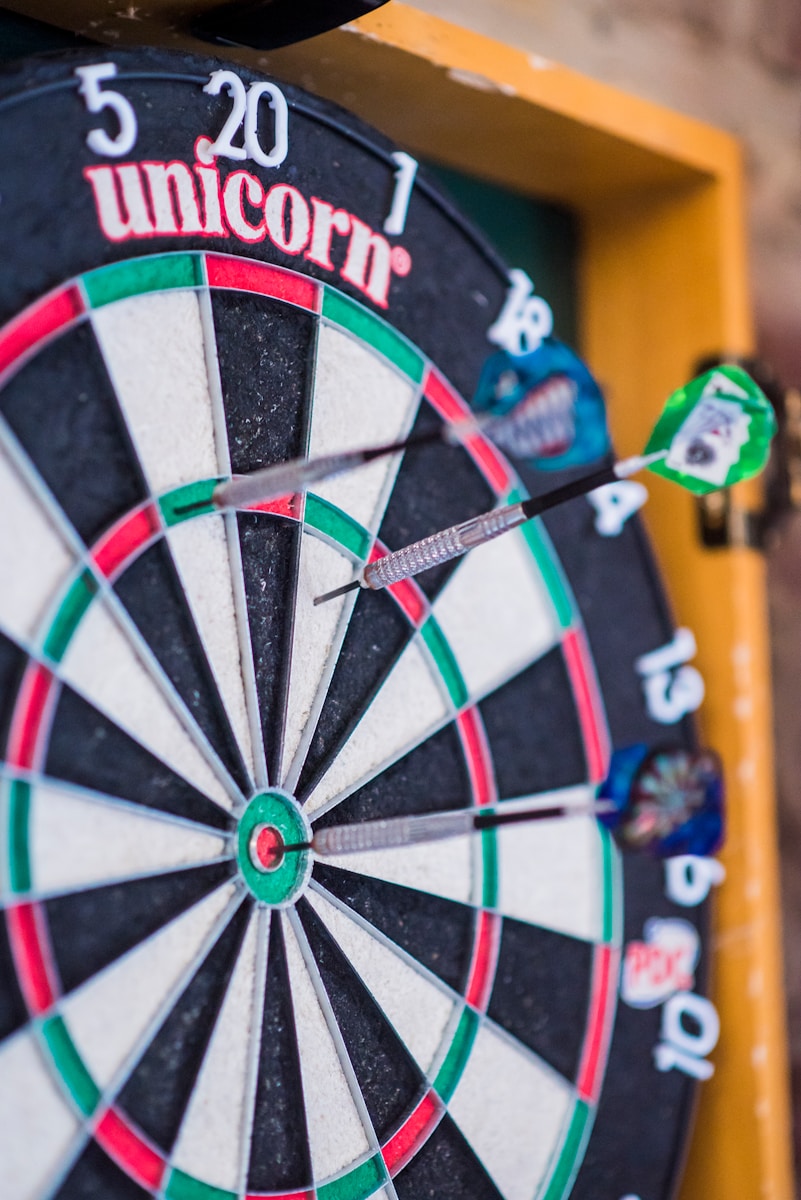 dart pins in board